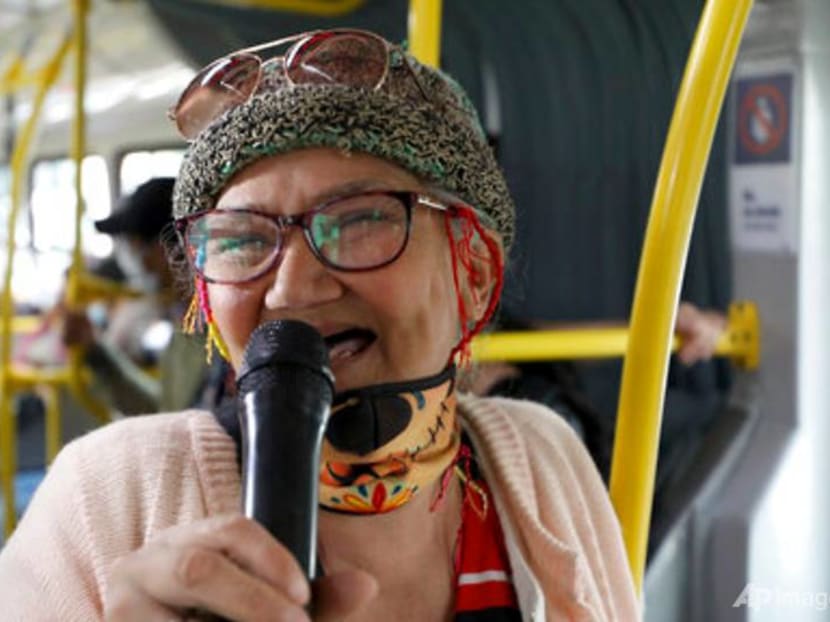 'Toothless Cindy' raps on Colombian buses to make ends meet