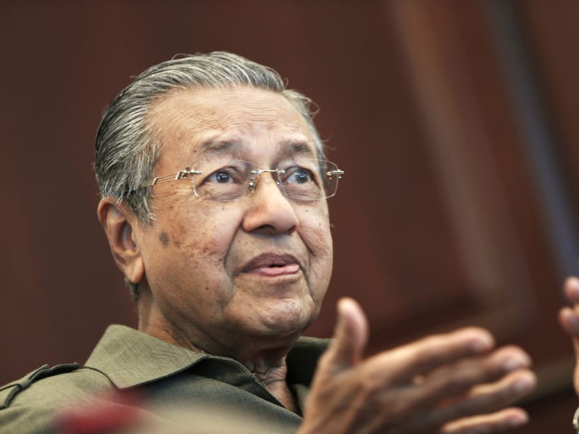 Former Malaysian prime minister Mahathir Mohamad speaks during an interview at his office in Kuala Lumpur on October 18, 2013. Photo: Reuters