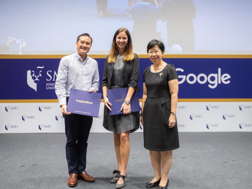 Mr Tan Kiat How, Chief Executive Officer of Infocomm Media Development Authority (IMDA), with Ms Stephanie Davis (centre), Country Director of Google Singapore, and SMU President Professor Lily Kong (right).