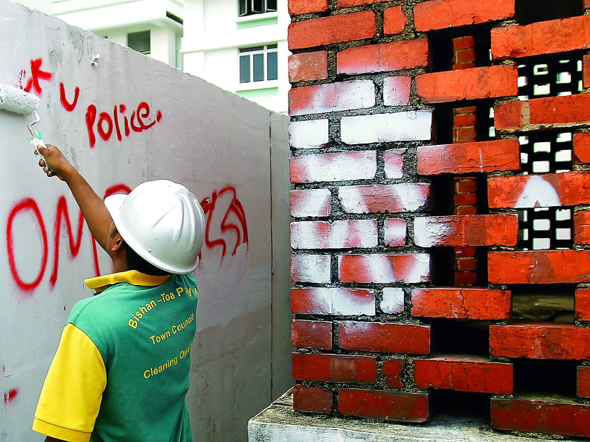 The graffiti along the rooftop of Toa Payoh Block 85A. Under the current security procedure, authorised personnel have to sign for the key that gives access 
to the rooftop. TODAY FILE PHOTO