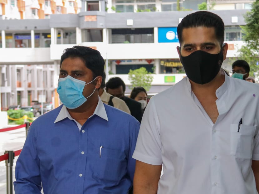 Parvis Ahmed Mohamed Ghouse (left) and Shaik Mohamed Mohamed Abdul Jaleel (right) leaving the State Courts on June 23, 2020. Parvis Ahmed Mohamed Ghouse (left) and Shaik Mohamed Mohamed Abdul Jaleel (right) leaving the State Courts on June 23, 2020.