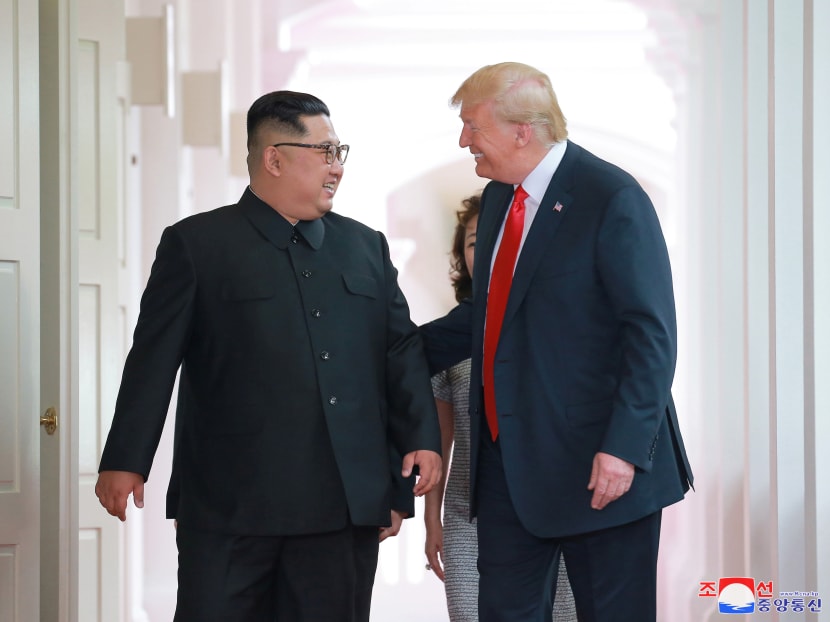 US President Donald Trump with North Korean leader Kim Jong-un at the Capella Hotel on Sentosa island in Singapore in this picture released on Tuesday (June 12) by North Korea's Korean Central News Agency.