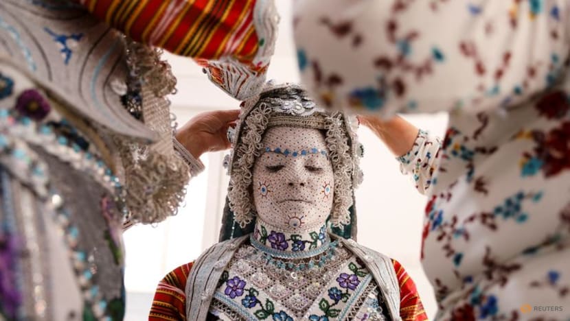 Face paint and folklore transform Chicago bride for traditional wedding in Kosovo Face paint and folklore transform Chicago bride for traditional wedding in Kosovo