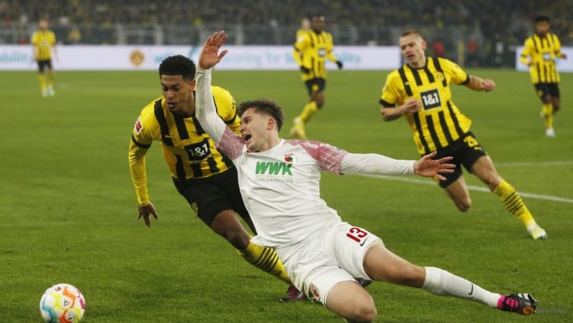 Dortmund earn rollercoaster 4-3 win over Augsburg on Haller return Dortmund earn rollercoaster 4-3 win over Augsburg on Haller return