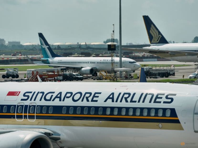 Singapore Airlines swings to profit as passenger traffic improves Singapore Airlines swings to profit as passenger traffic improves