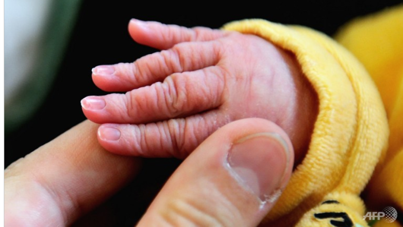 Open verdict on death of 3-week-old boy who fell asleep in arms of confinement nanny Open verdict on death of 3-week-old boy who fell asleep in arms of confinement nanny