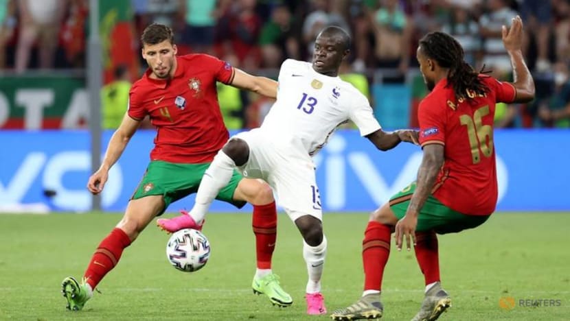 Football: France top group, Portugal squeeze into last 16 after 2-2 draw Football: France top group, Portugal squeeze into last 16 after 2-2 draw