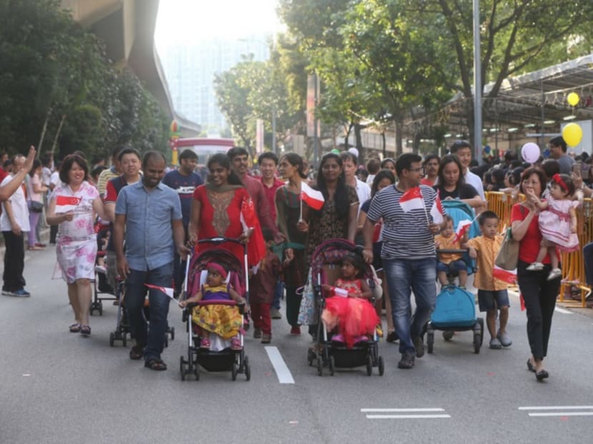 Punggol residents, along with participating groups, at the Punggol North Racial and Religious Harmony Street Parade on July 17. This uniquely Punggol North festival is an annual grassroots initiative since 2005. It celebrates the dynamism of Singapore’s multi-racial society. The festival also aims to promote racial harmony, inter-faith understanding, as well as religious harmony among residents in Punggol North. Photo: Ooi Boon Keong/TODAY