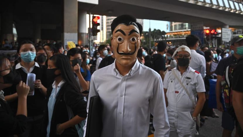 No more masks: The colonial-era law that gives Hong Kong leader sweeping powers