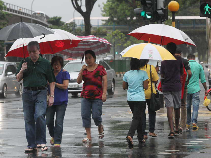 Rain brings relief to sweltering S’pore