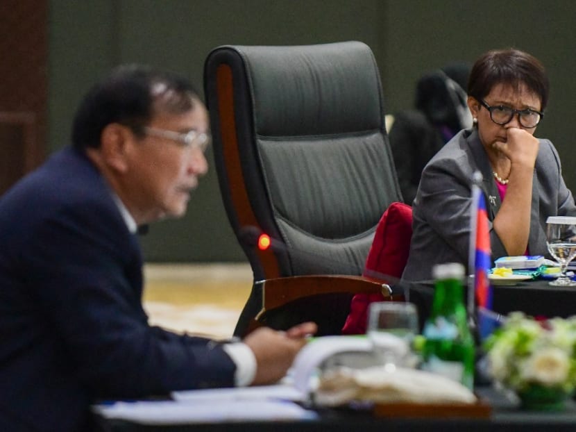 This handout picture taken and released on Oct 27, 2022 by the Association of Southeast Asia Nations (Asean) shows Indonesia's Foreign Minister Retno Marsudi looking on as Cambodia's Foreign Minister Prak Sokhonn speaks during the Special Asean Foreign Ministers' Meeting at the Asean secretariat general building in Jakarta.