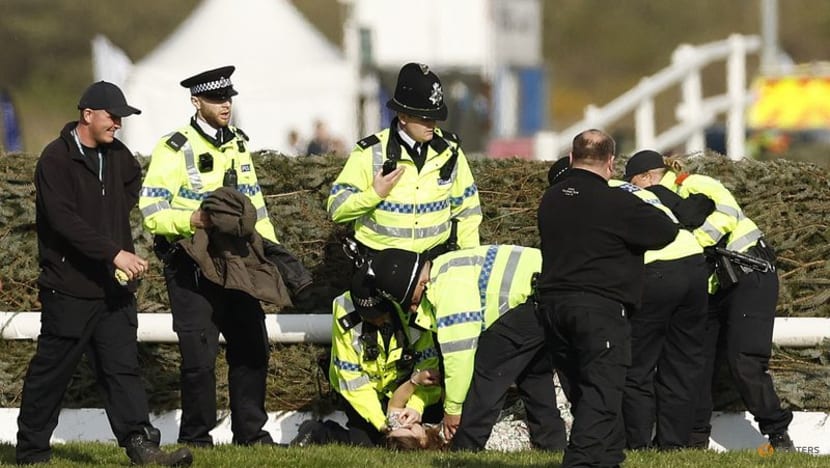 Protesters delay start of Britain's Grand National horse race Protesters delay start of Britain's Grand National horse race