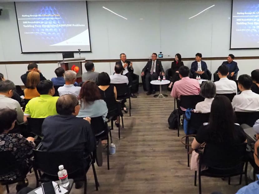 Participants from small- and medium-sized enterprises talked about the difficulties they face during the Covid-19 outbreak, at a discussion hosted by the Singapore Chinese Chamber of Commerce and Industry on March 5, 2020. Participants from small- and medium-sized enterprises talked about the difficulties they face during the Covid-19 outbreak, at a discussion hosted by the Singapore Chinese Chamber of Commerce and Industry on March 5, 2020.
