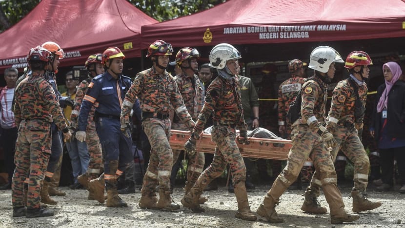 Malaysia landslide: Death toll rises to 24 as search continues at campsite Malaysia landslide: Death toll rises to 24 as search continues at campsite