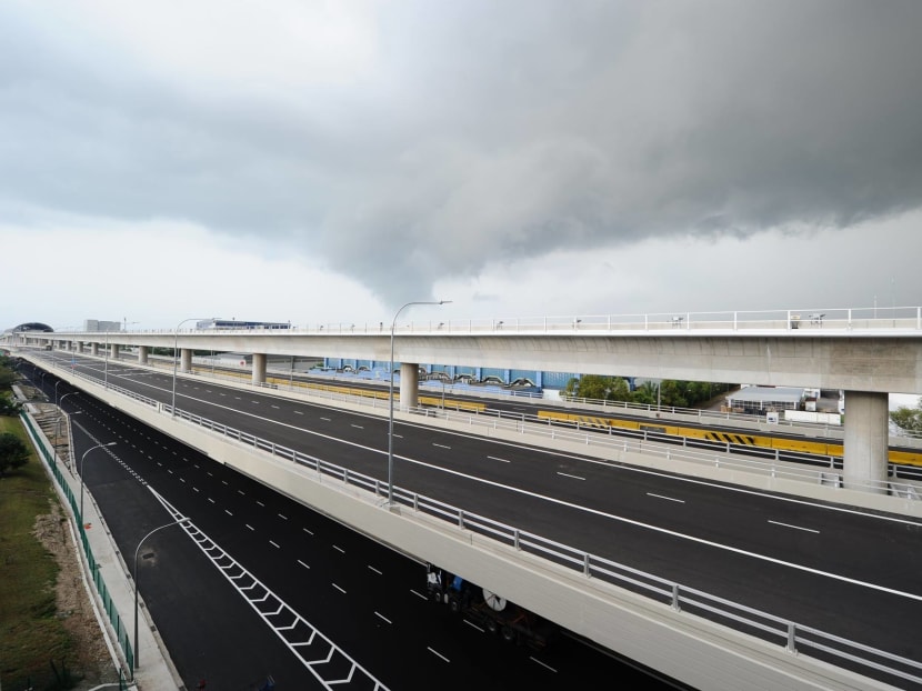 The Tuas Viaduct is Singapore's first integrated rail-road viaduct. The busy Pioneer Road runs beneath it. Photo: LTA