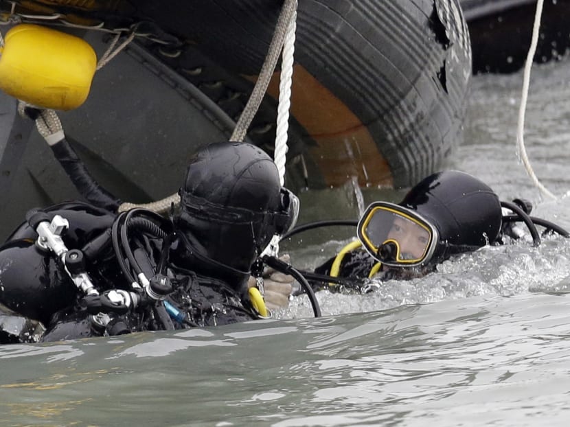 Bodies seen trapped in sunken Korean ferry as hundreds remain missing