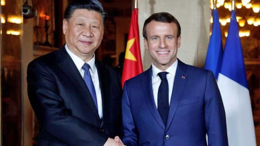 Xi meets Macron as French president seeks united EU front on China Xi meets Macron as French president seeks united EU front on China