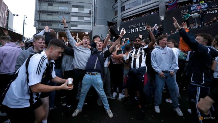 Fans ecstatic but human rights groups condemn Newcastle's takeover Fans ecstatic but human rights groups condemn Newcastle's takeover