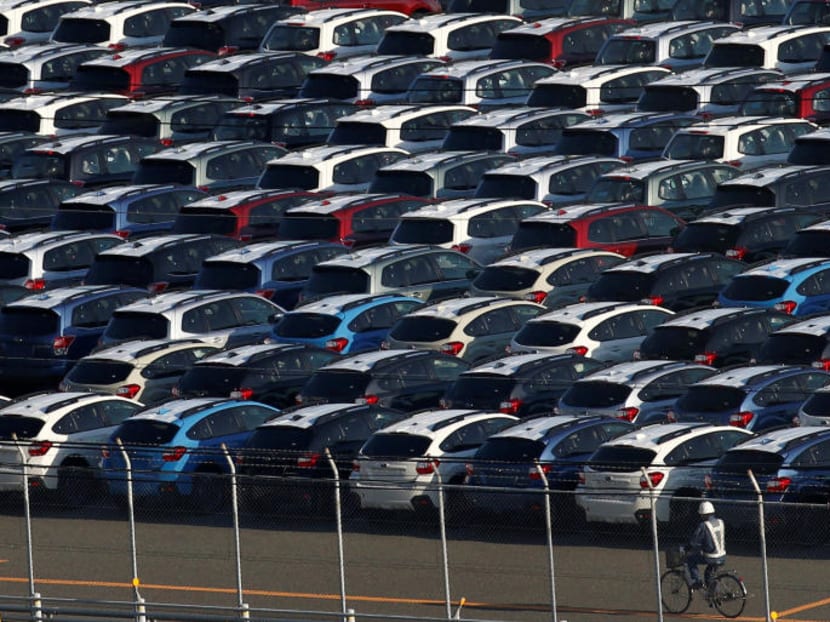 Newly produced cars at an industrial port in Kawasaki, Japan. Lesser and lesser of these are hitting Japanese roads. Photo: Reuters