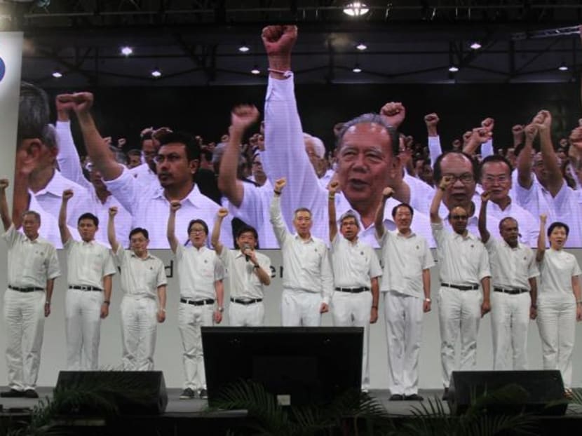 The newly voted-in Central Executive Committee at the PAP60 Party Rally on stage at the Singapore Expo on Dec 7, 2014. Photo: Ooi Boon Keong