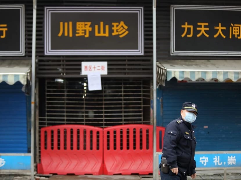 Wuhan Huanan Seafood Wholesale Market is closed and under guard after being linked to the mystery illness late last month. Wuhan Huanan Seafood Wholesale Market is closed and under guard after being linked to the mystery illness late last month.
