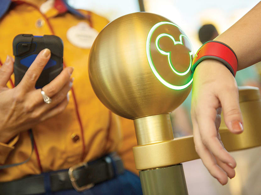 At Walt Disney World, MyMagic+ wrist­bands serve as room 
keys and theme park tickets, among other things. Photo: Disney