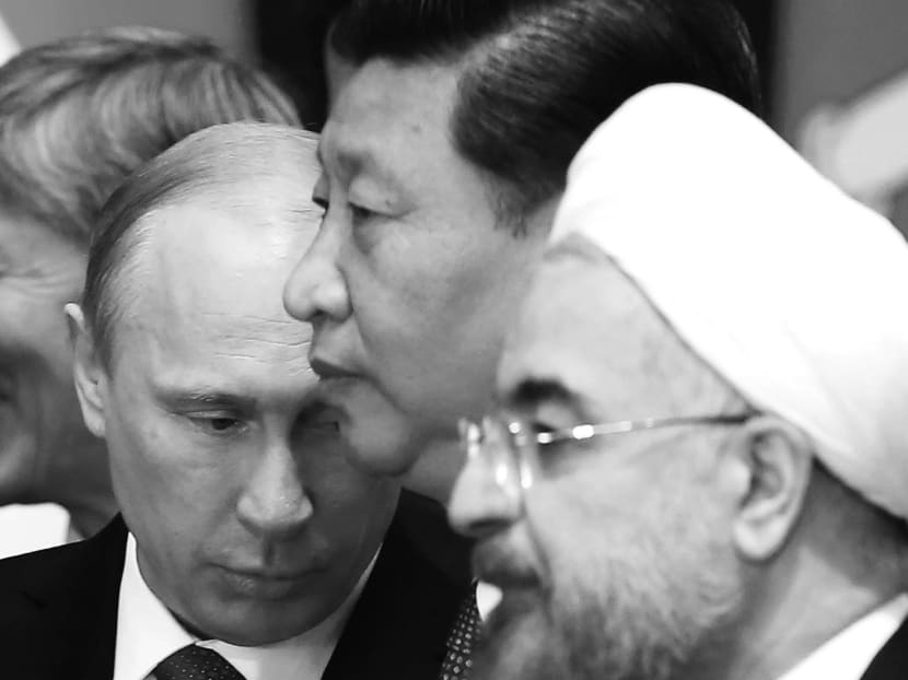 (From left) The Presidents of Russia, China and Iran: Mr Putin, Mr Xi Jinping and Mr Hassan Rouhani. These nations never bought into the geopolitical settlement that followed the Cold War, said Prof Mead. PHOTO: REUTERS