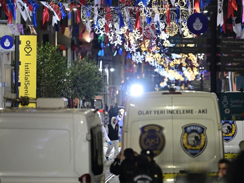 Turkish policemen secure the area after a strong explosion of unknown origin shook the busy shopping street of Istiklal in Istanbul, on Nov 13, 2022.