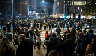 Dutch police fire warning shots as COVID-19 riots hit Rotterdam