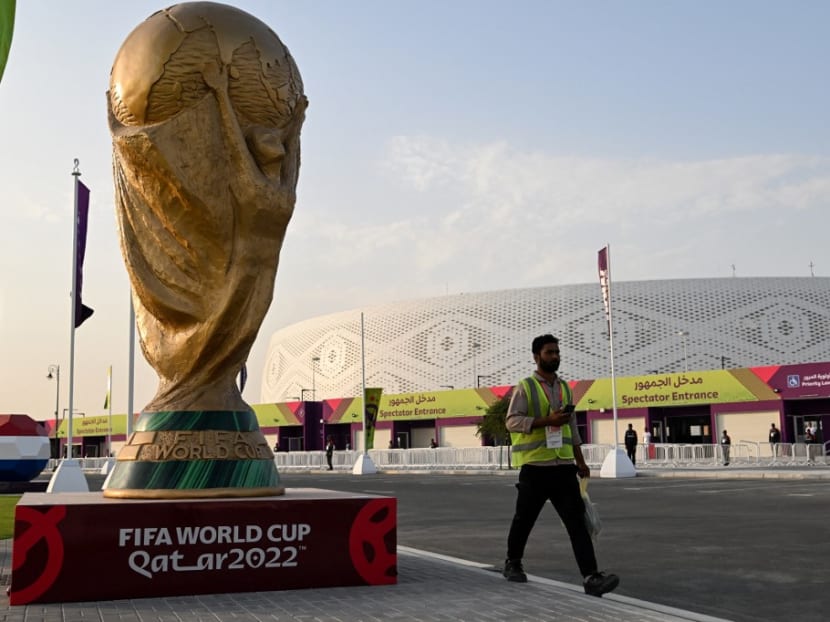 A man walking outside the Al-Thumama Stadium in Doha on Nov 8, 2022, ahead of the Qatar 2022 Fifa World Cup football tournament. A man walking outside the Al-Thumama Stadium in Doha on Nov 8, 2022, ahead of the Qatar 2022 Fifa World Cup football tournament.