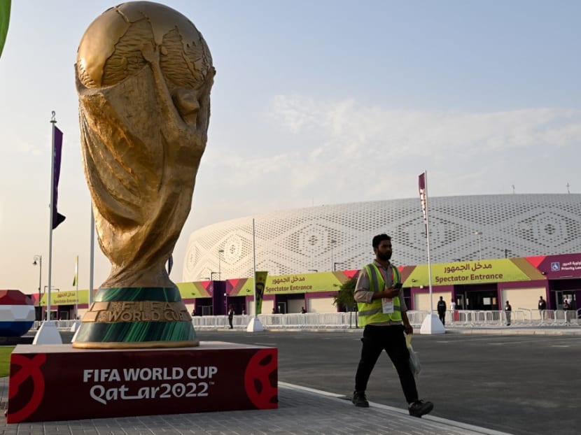 A man walking outside the Al-Thumama Stadium in Doha on Nov 8, 2022, ahead of the Qatar 2022 Fifa World Cup football tournament.