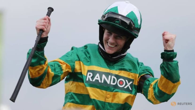 Horse racing-Blackmore makes history with Grand National win on Minella Times Horse racing-Blackmore makes history with Grand National win on Minella Times