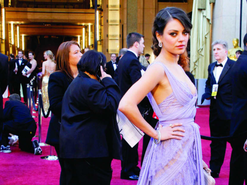 An Ellie Saab “lingerie dress” worn by actress Mila Kunis to the Oscars in 2011.