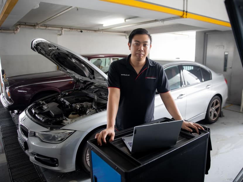 Motor Edgevantage’s tuning specialist, Mr Nicholas Lee, 27, poses for a photo at the workshop, located in Sin Ming AutoCity, on June 28, 2023. Motor Edgevantage’s tuning specialist, Mr Nicholas Lee, 27, poses for a photo at the workshop, located in Sin Ming AutoCity, on June 28, 2023.