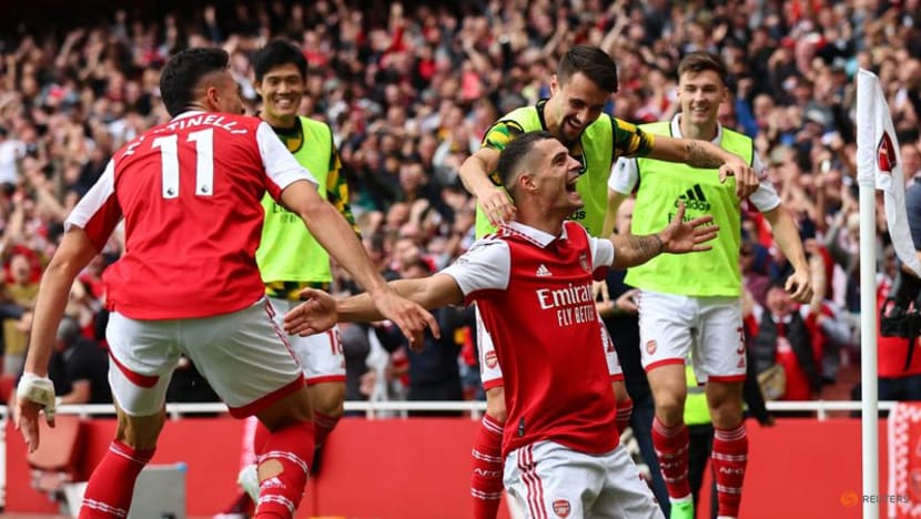 Arsenal stay top with derby win as Tottenham self-destruct