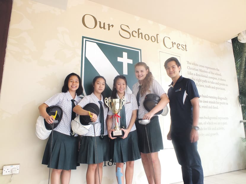 (From left) St Margaret’s Caryl Lei, Charmain Ooi, Yvette Lim and Anastasia Karpova, with coach Dennis Leong. Photo: Dennis Leong