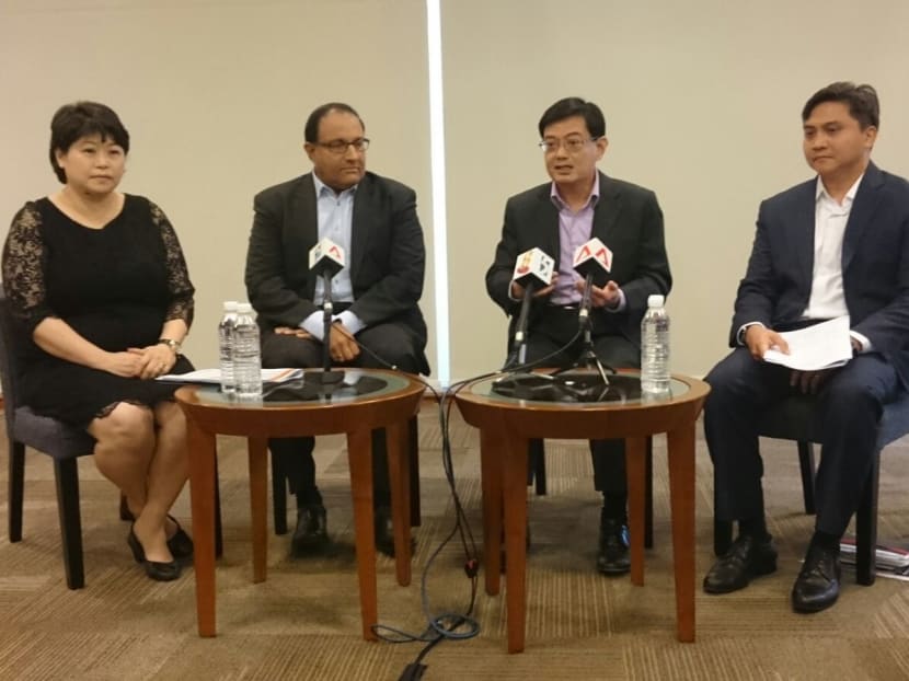 Ms Susan Chong - Founder and CEO, Greenpac; Mr S Iswaran, Minister for Trade and Industry (Industry); Mr Heng Swee Keat, Minister for Finance; Mr Saktiandi Supaat, Executive Vice President, Head of FX Research, Global Markets, Global Banking, Maybank Group. Photo: Lee Yen Nee/TODAY