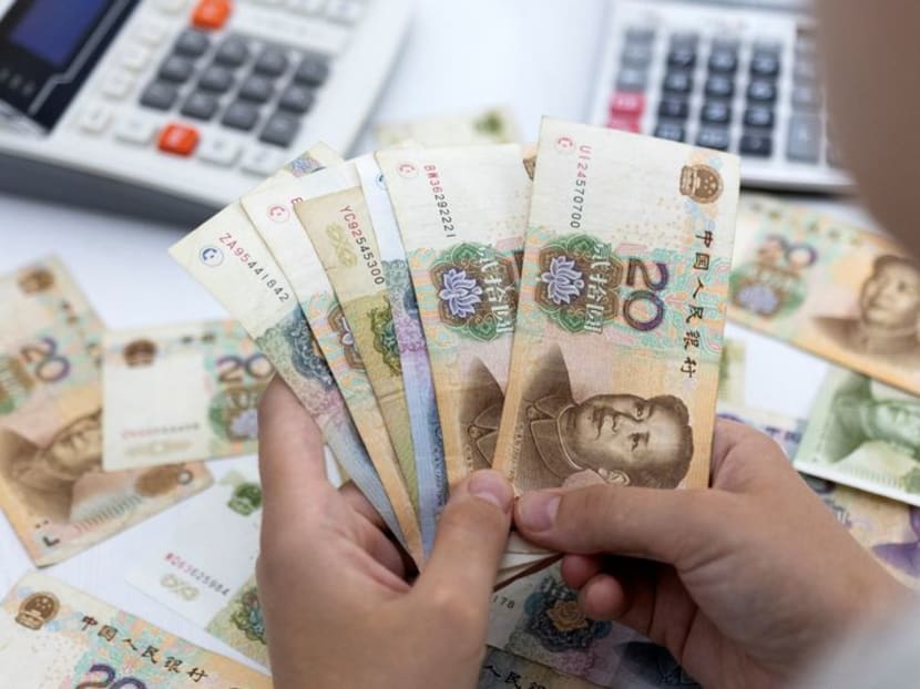 2023 12 30t220421z 1 lynxmpejbt088 rtroptp 3 china yuan