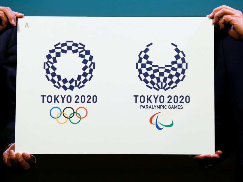Tokyo 2020 Emblems Selection Committee Chairperson Ryohei Miyata (R) and committee member Sadaharu Oh present the winning design of the Tokyo 2020 Olympic Games and Paralympic Games during its unveiling ceremony in Tokyo, Japan on, April 25, 2016. Photo: Reuters