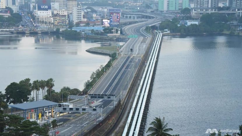 Singapore, Malaysia agree to allow cross-border travel for some residents and business travellers Singapore, Malaysia agree to allow cross-border travel for some residents and business travellers