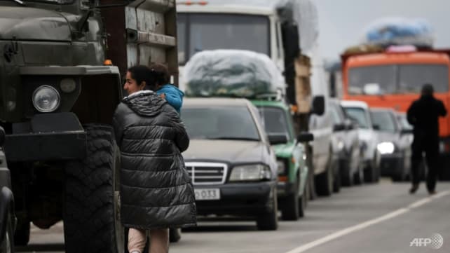 Thousands flee into Armenia after Azerbaijan retakes enclave