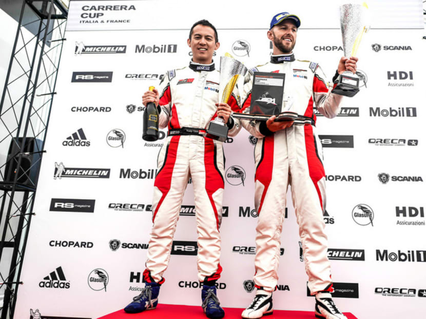 Yuey Tan (left) and Chris van der Drift on the podium after the Porsche Carrera Cup France at Spa-Francorchamps. Photo: The Film Dispensary