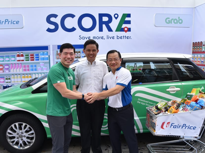 L-R: Mr Anthony Tan, Group CEO and Co-Founder of Grab, Mr Chan Chun Sing, Secretary-General of the National Trade Union Congress and Mr Seah Kian Peng, CEO of NTUC FairPrice at the launch of SCORE Subscription Programme. Photo: NTUC FairPrice/Grab