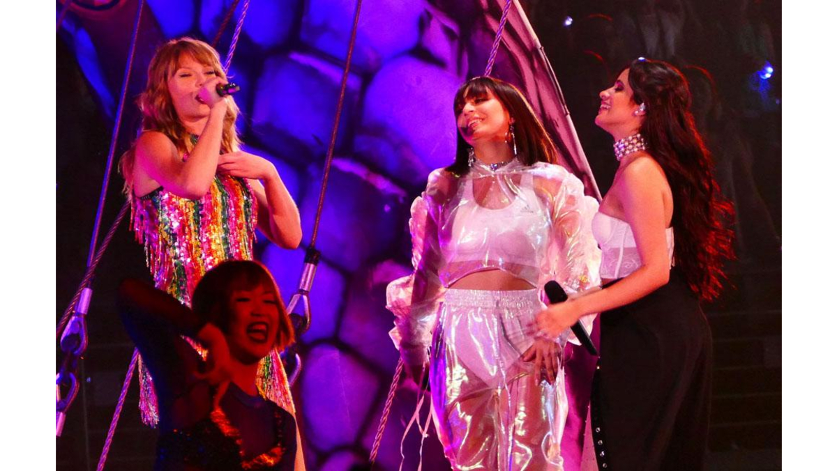 Charli XCX suffers boob slip on stage - 8 Days