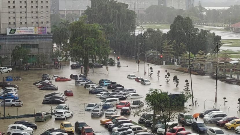 Flash floods hit parts of Johor Bahru, leaving vehicles trapped in water   