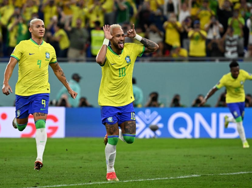 Brazil's forward Neymar celebrates after scoring his team's second goal from the penalty spot during the Qatar 2022 World Cup round of 16 football match between Brazil and South Korea at Stadium 974 in Doha on Dec 5, 2022.