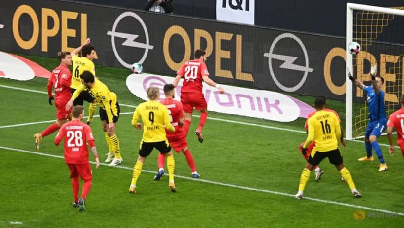 Football: Dortmund beat Augsburg 3-1 for first win in four games Football: Dortmund beat Augsburg 3-1 for first win in four games