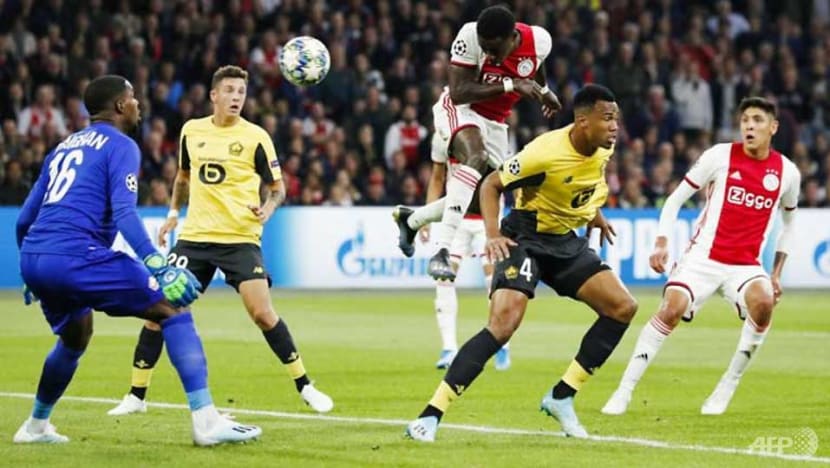 Football: Ajax open Champions League account with Lille thumping amid mass fan arrests Football: Ajax open Champions League account with Lille thumping amid mass fan arrests