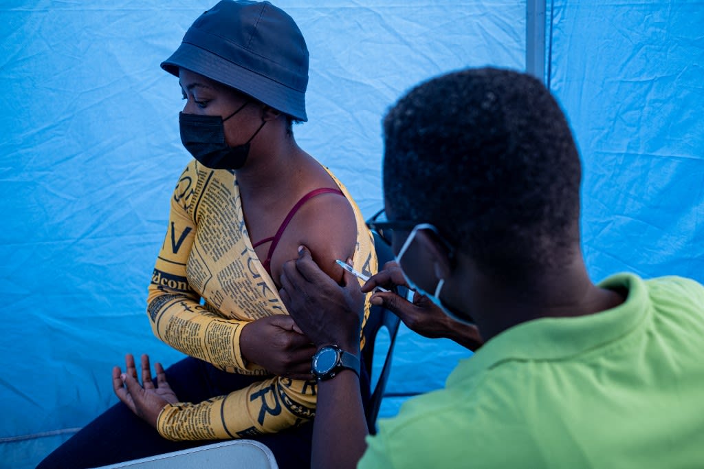 A patient gets vaccinated against Covid-19 by the Witkoppen clinic at the Kya Sands informal settlement Johannesburg on Dec 8, 2021. A patient gets vaccinated against Covid-19 by the Witkoppen clinic at the Kya Sands informal settlement Johannesburg on Dec 8, 2021.