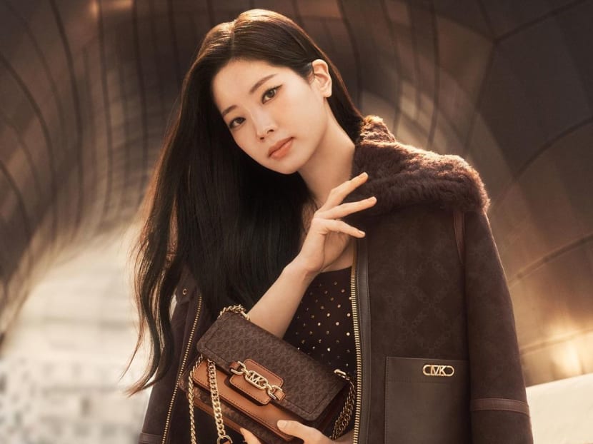 Michael Kors - Global Brand Ambassador #Dahyun, of global group #Twice,  layers up in Empire Signature Logo with our Parker 2-in-1 bag in Seoul. # MichaelKors